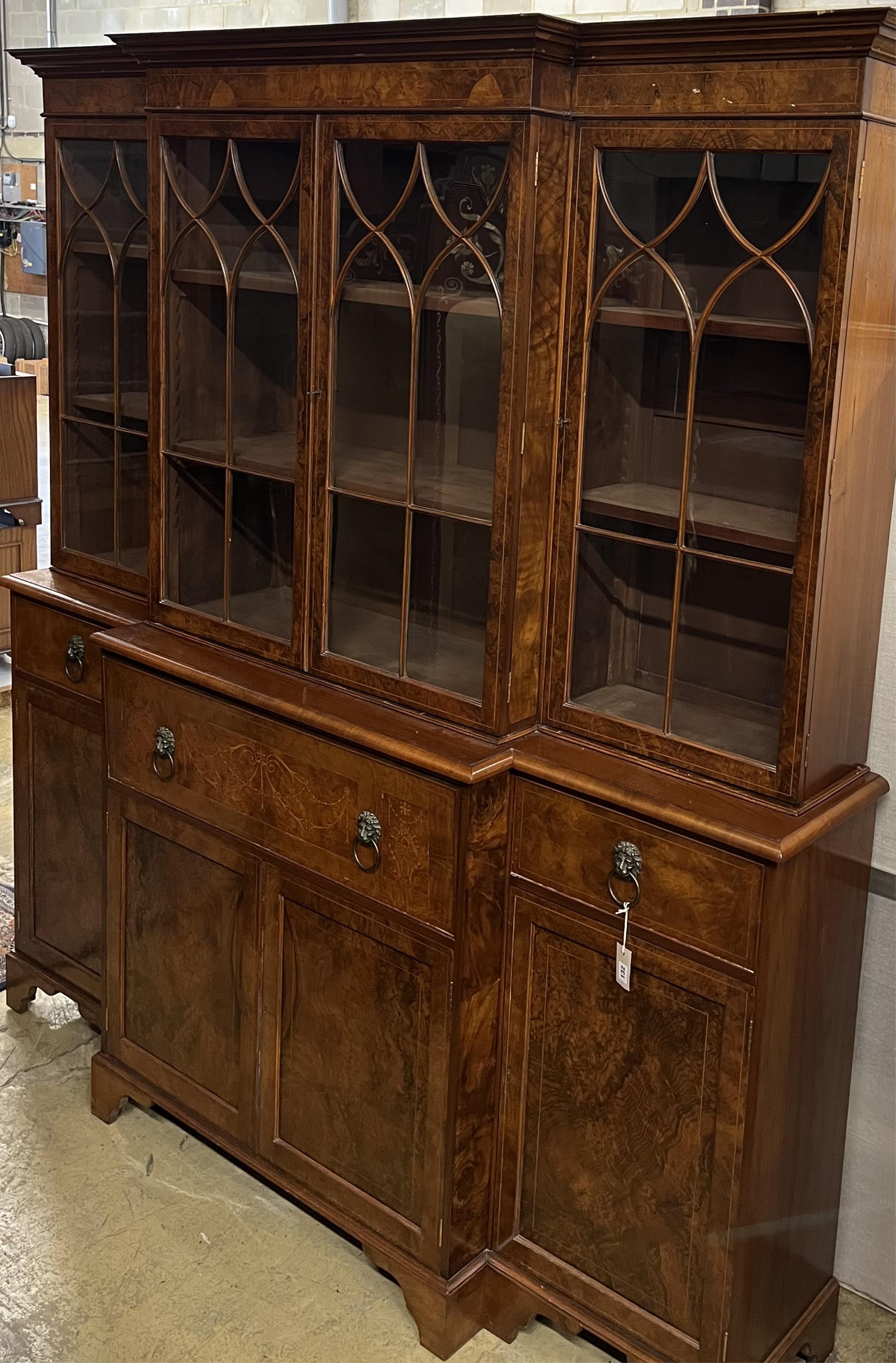 A George III design inlaid burr walnut breakfront library bookcase, width 208cm, depth 36cm, height 124cm. Condition - good